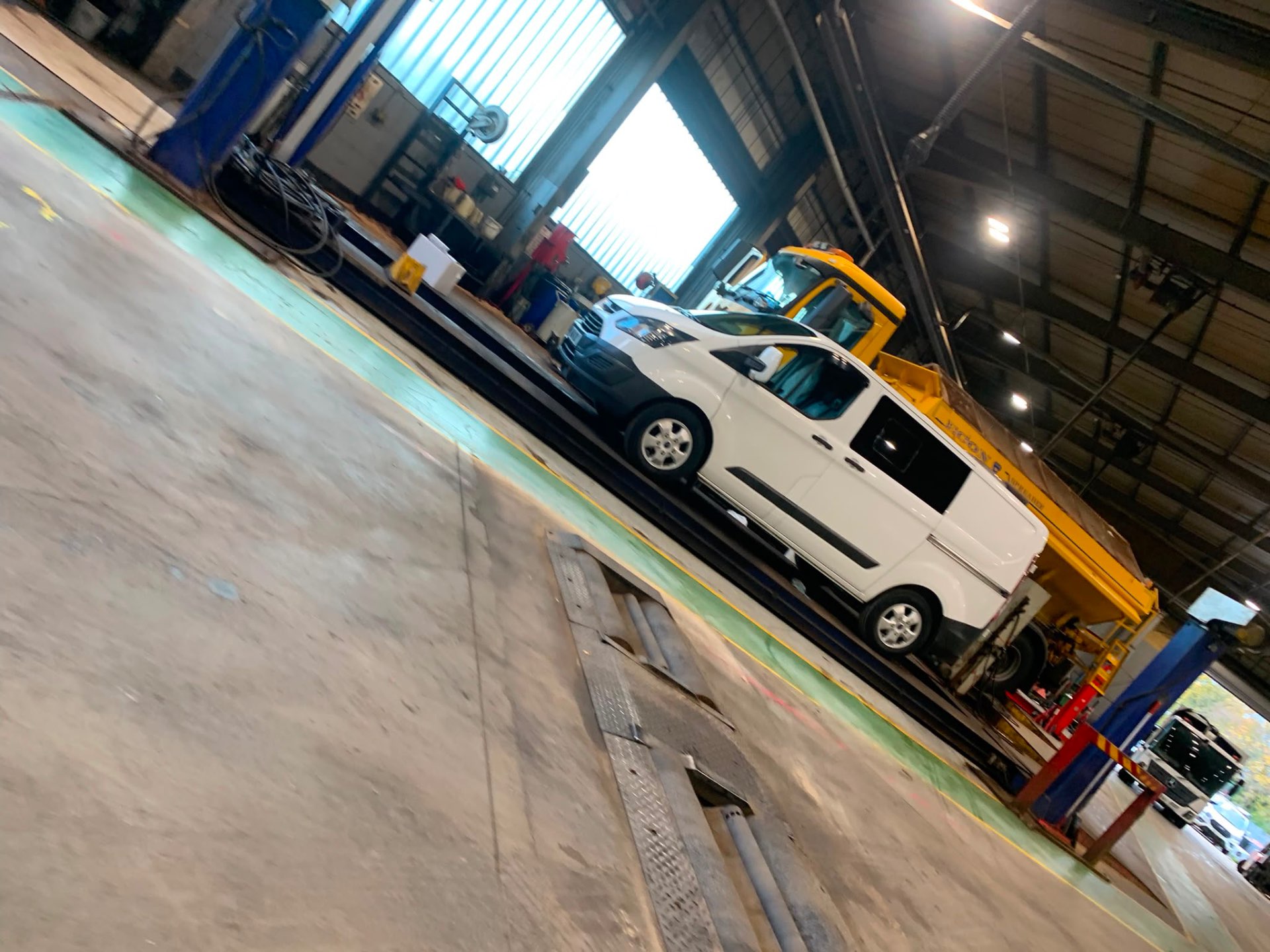 Ford Transit Custom van on a commercial vehicle lift